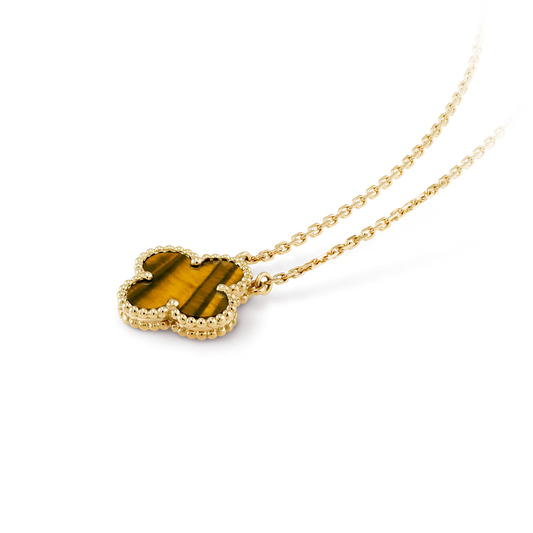 Van Cleef & Arpels, Vintage Alhambra pendant, 18K yellow gold, tiger’s eye