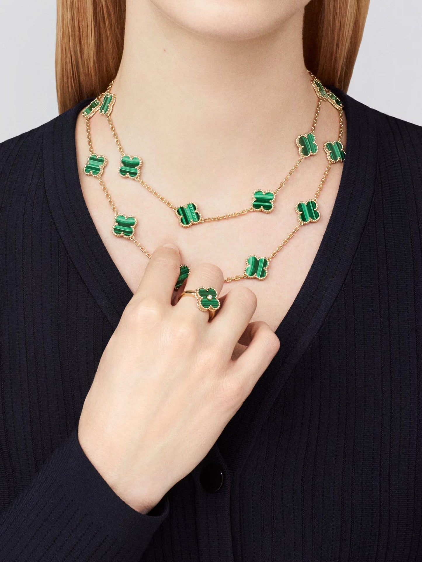 Van Cleef & Arpels, Vintage Alhambra long necklace, 20 motifs, 18K yellow gold, malachite.