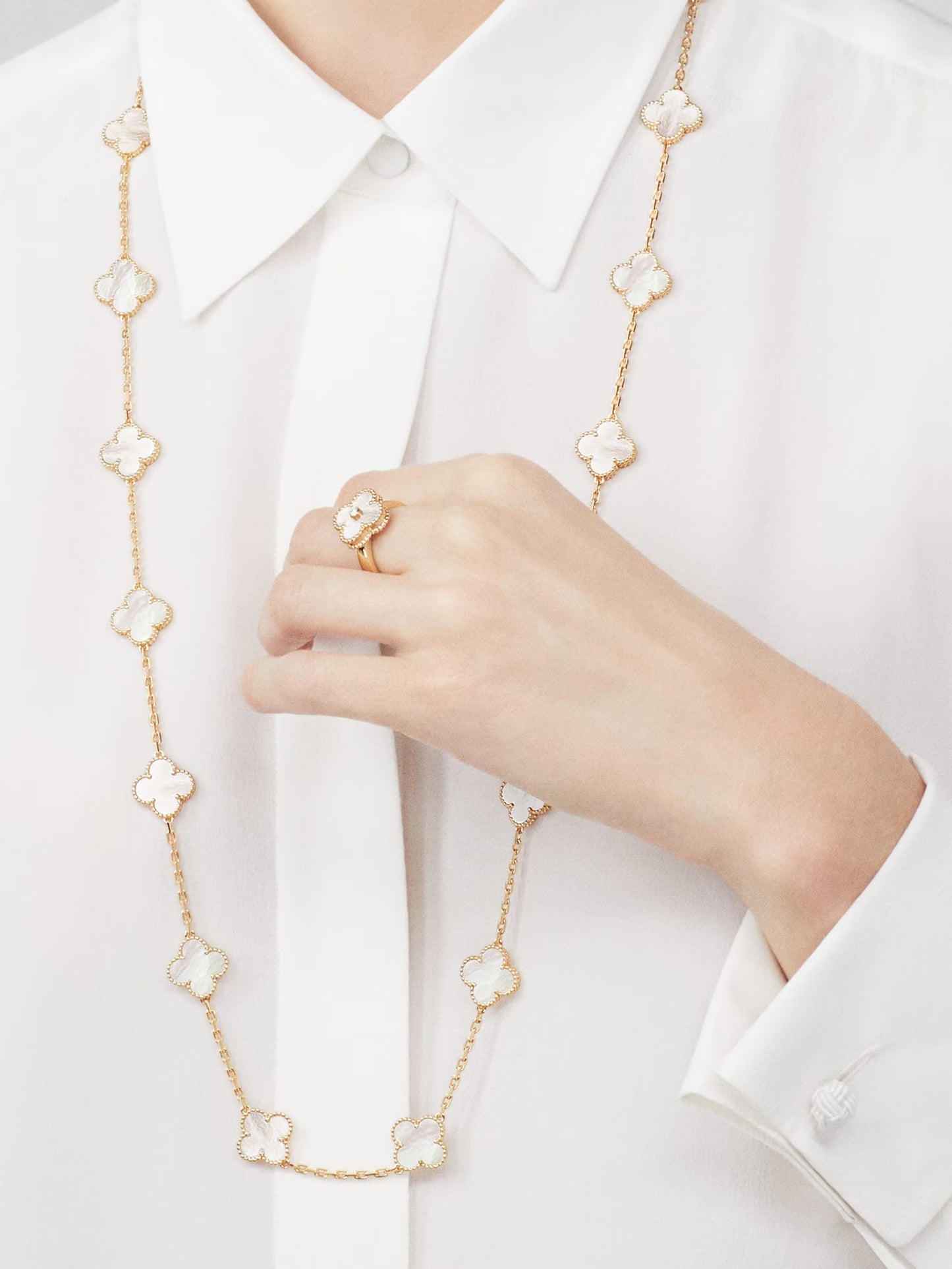 Van Cleef & Arpels, Vintage Alhambra long necklace, 20 motifs, 18K yellow gold, white mother-of-pearl