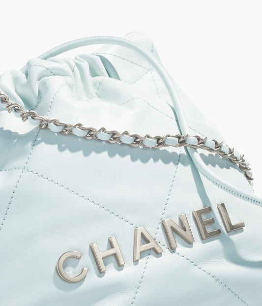 Chanel 22 Mini Handbag Shiny Calfskin & Silver-Tone Metal - Light Blue