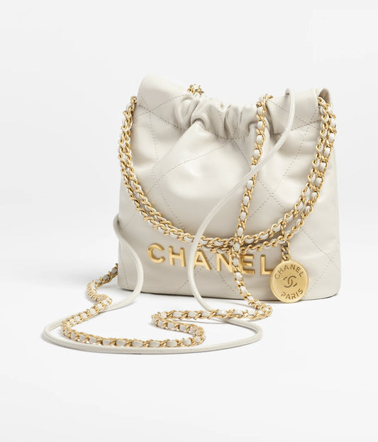 Chanel 22 Mini Handbag Shiny Calfskin & Gold-Tone Metal - Light Grey