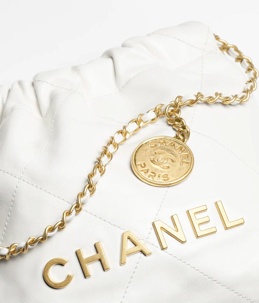 Chanel 22 Mini Handbag Shiny Calfskin & Gold-Tone Metal - White