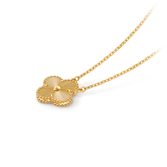 Van Cleef & Arpels, Vintage Alhambra pendant, guilloché 18K yellow gold