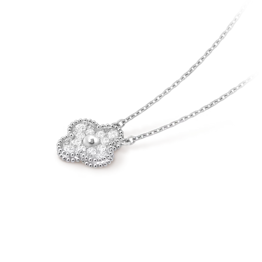 Van Cleef & Arpels, Vintage Alhambra pendant, rhodium plated 18K white gold, round diamonds