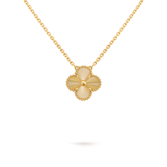 Van Cleef & Arpels, Vintage Alhambra pendant, guilloché 18K yellow gold